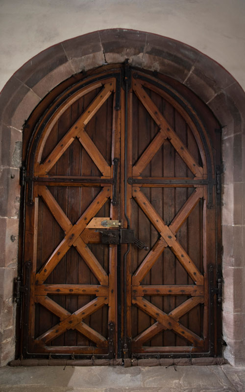 Old wooden door in listed property